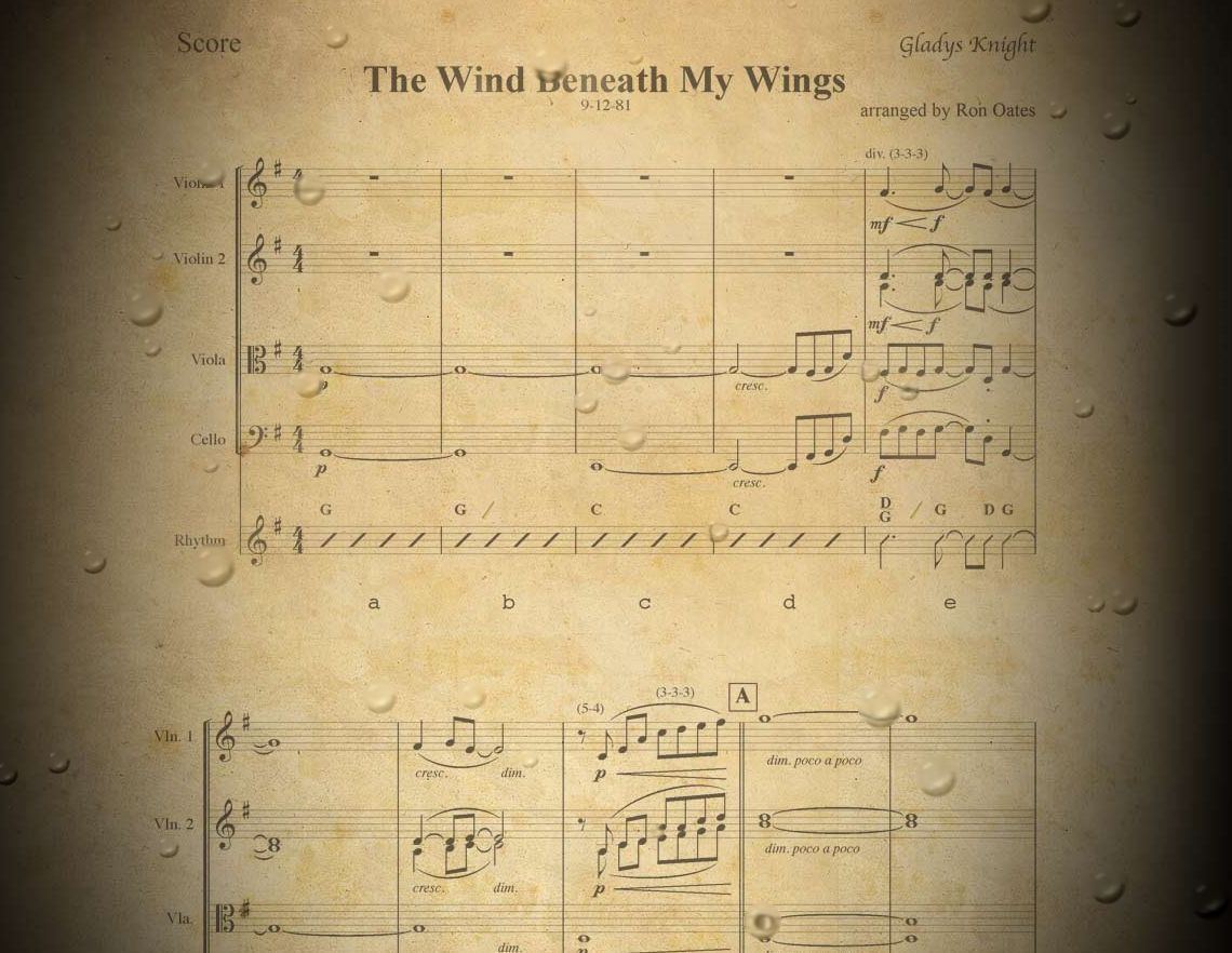 Ron Oates writing a song arrangement
